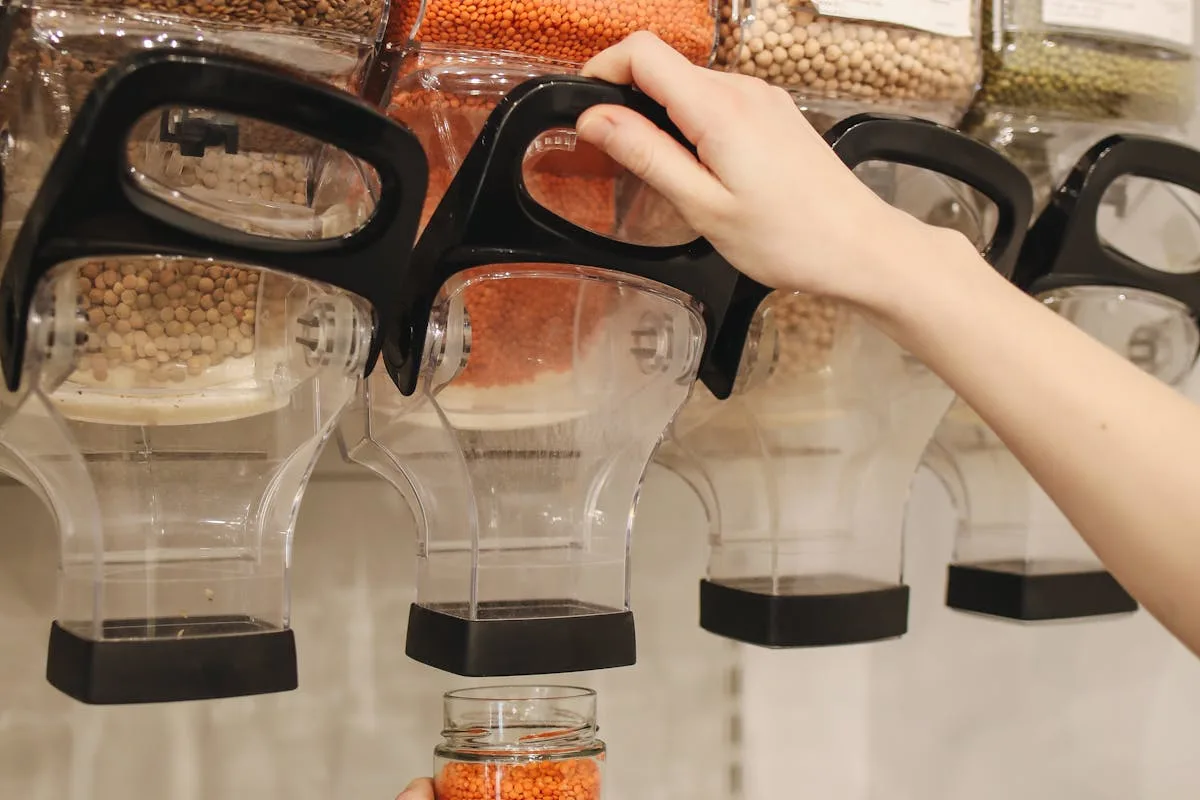 Blender with fresh fruit and smoothie ingredients