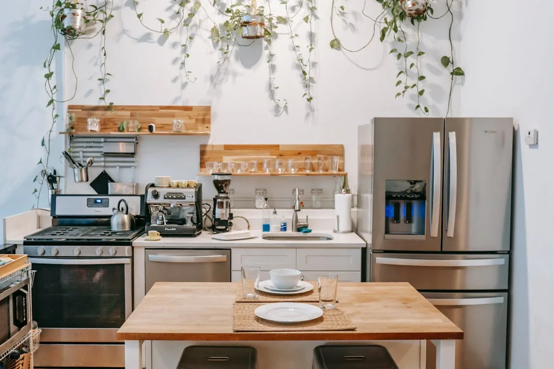 Clean dishes drying in a small kitchen