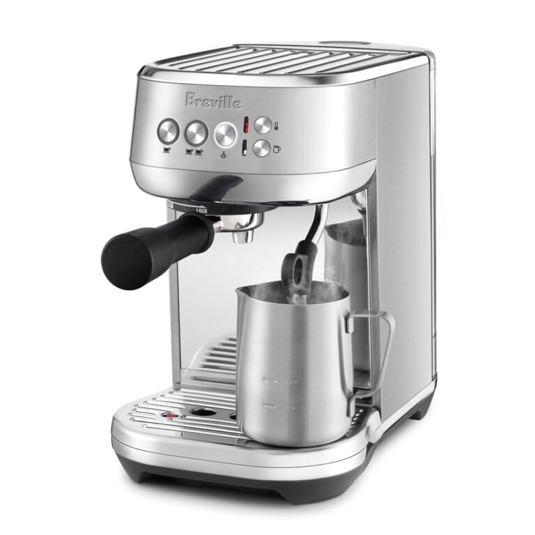 Breville Bambino Plus. Brushed stainless steel espresso machine with milk jug.